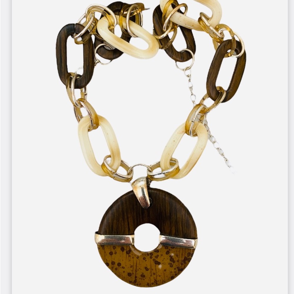 Decorative chain link necklace, with faux wooden pendant. Makes a statement.